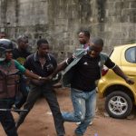 A man being arrested by Task Force officials