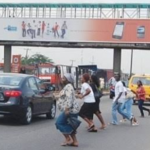 Pedestrians crossing the Highway