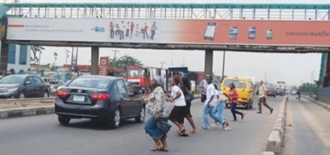 Pedestrians crossing the Highway